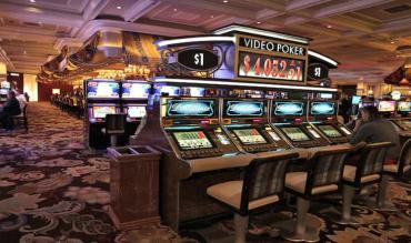 Videopoker: Bankroll-størrelse, Varians, Tilbagebetaling og Risiko for Ruin
